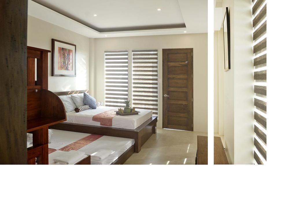 Allure Badian Beach Villa Buitenkant foto